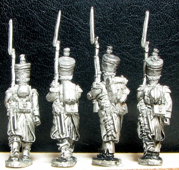 F27 Four grenadier figures in march-attack poses back